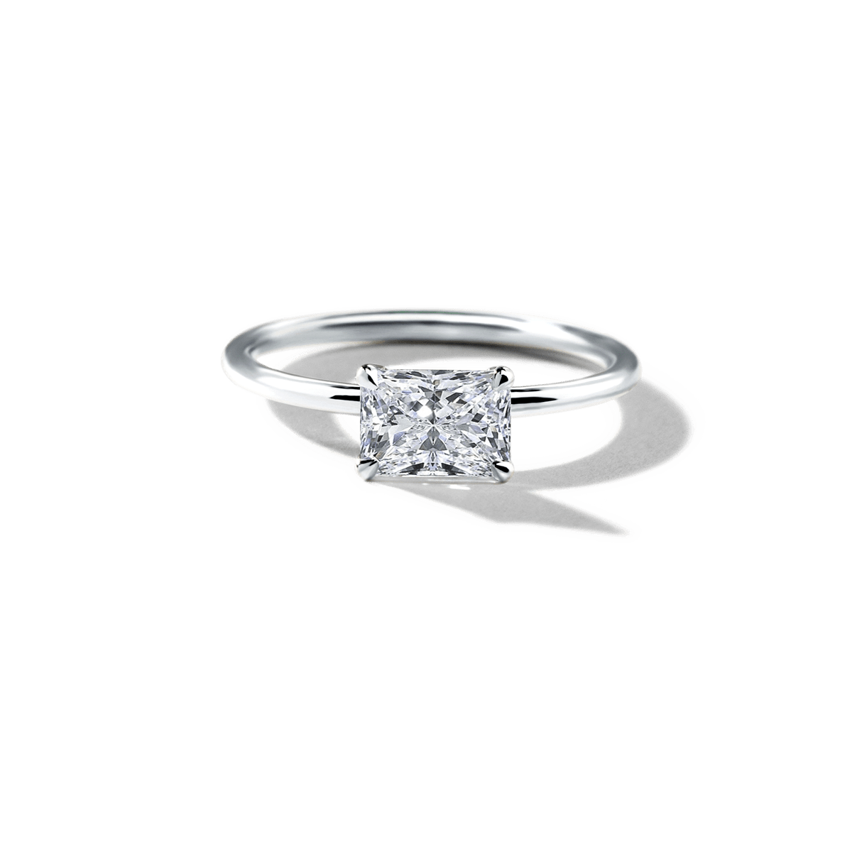 East - West Hidden Halo Engagement Ring