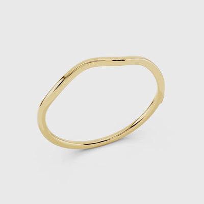 Yellow gold wave bangle detail video showing smooth polished finish