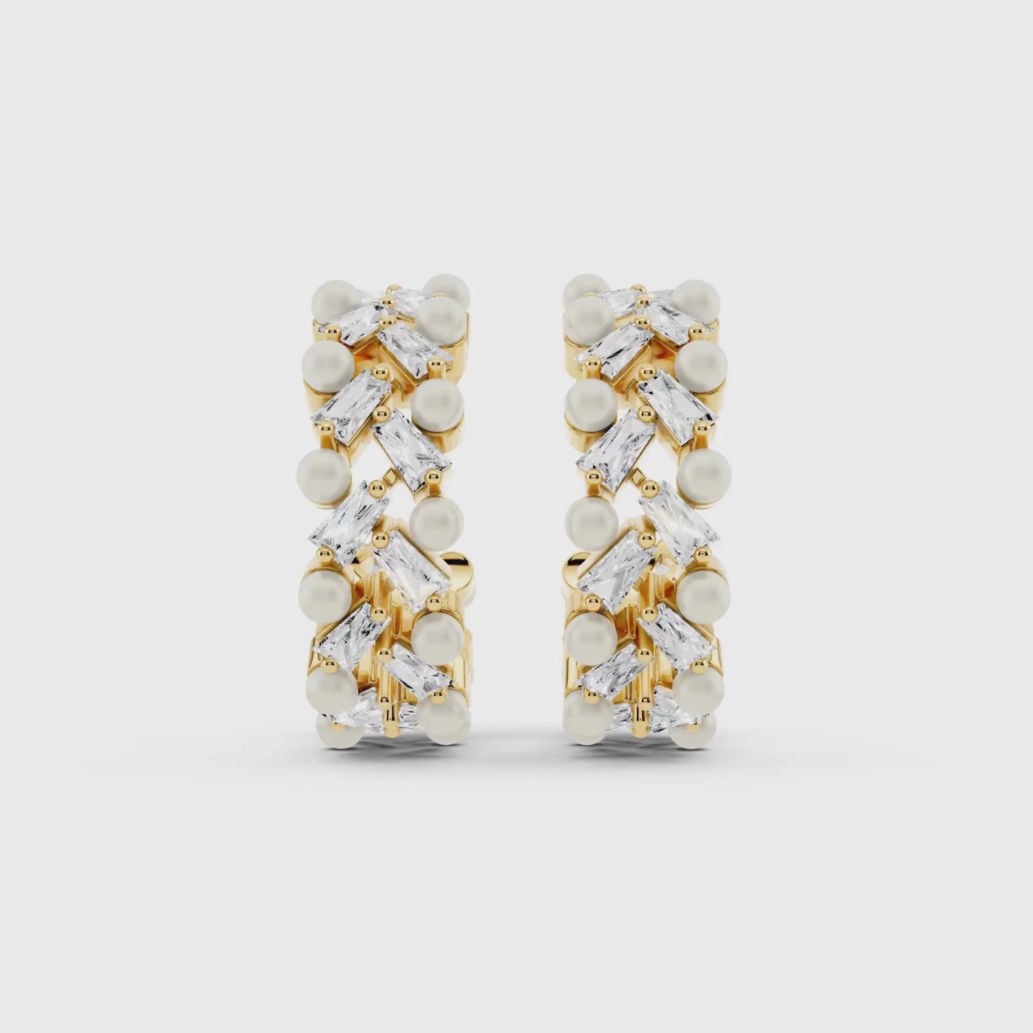 Close-up video of diamond pearl mosaic hoops showing baguette diamonds and seed pearls