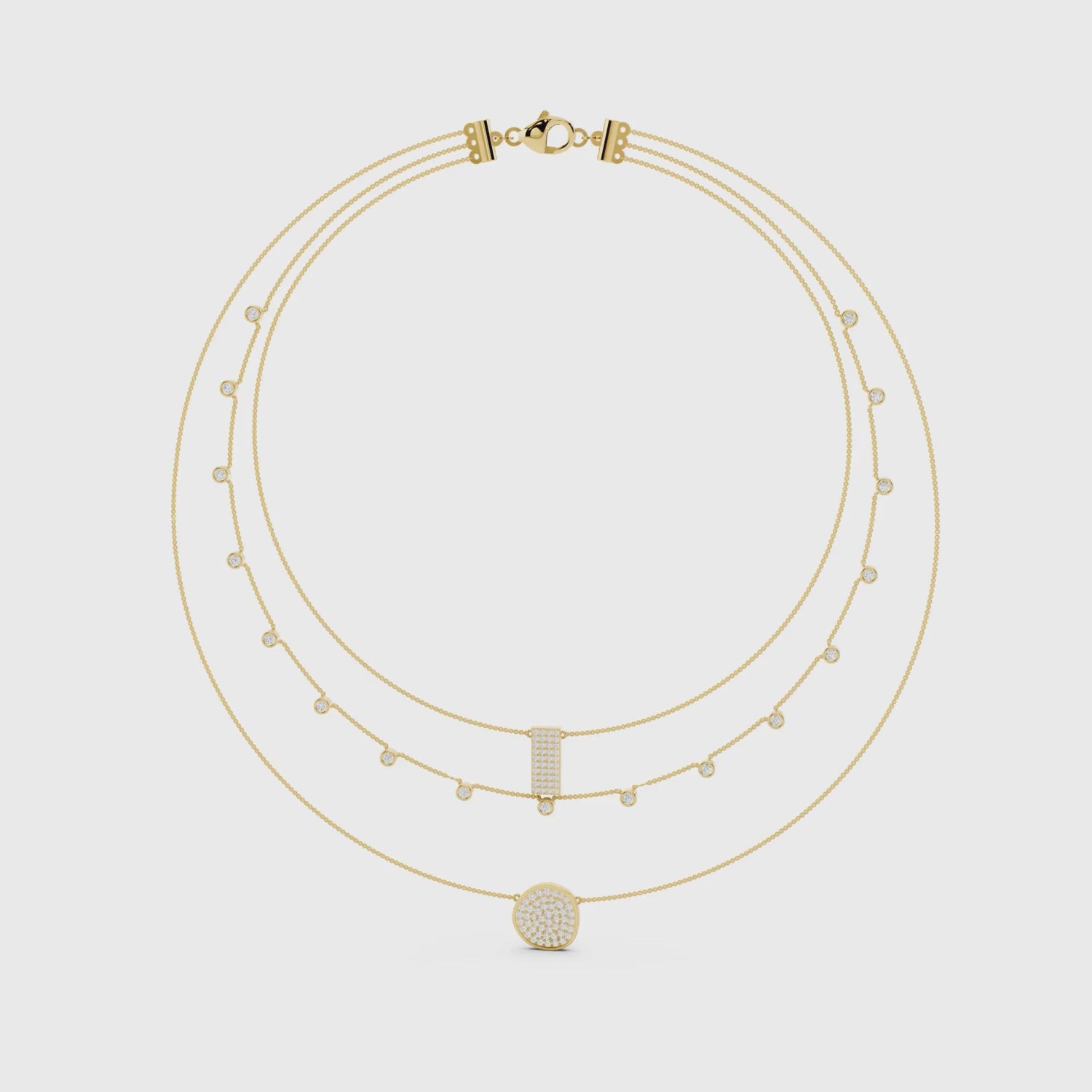 Yellow gold triple strand diamond necklace showing layered pendant detail video