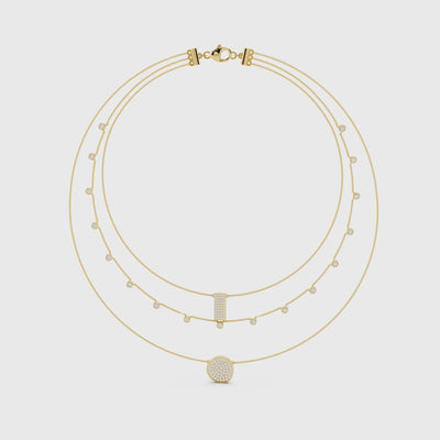 Yellow gold triple strand diamond necklace showing layered pendant detail video