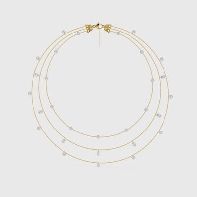 Yellow gold triple strand pear diamond necklace showing delicate layered design video